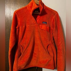 Patagonia size medium. Orange fleece pullover.